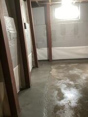 Our crew installed several i-beams and a new drainage system in MD's home to prevent his foundation and water problems.