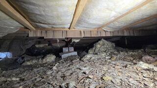 Upon inspecting the crawl space, our Design Specialist discovered a significant amount of debris and deteriorated insulation that had accumulated over time.