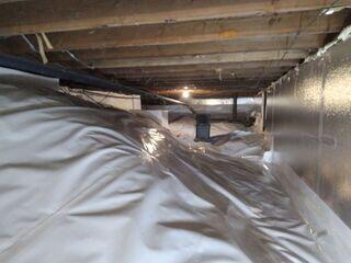 Partnered with our CleanSpace vapor barrier, our SilverGlo (silver panels on wall) helps keep the heat in.