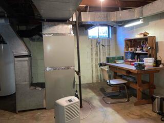 This basement was getting water seepage and there are many signs of past water damage so a permanent solution was a must.