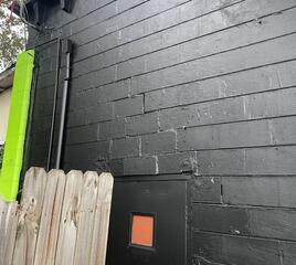 One of the most noticeable signs for the shop owners that their foundation required repair was the appearance of stair-step cracks along the exterior walls of the building.