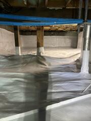 The support beams in the crawl space are also wrapped with the CleanSpace moisture barrier to help provide greater protection against moisture damage.