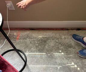 The homeowner reported that rainwater had leaked into this area of the home, prompting them to seek a dependable drainage solution.