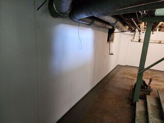 The BrightWall panels will keep wall moisture out, and will filter water down to the subfloor drains.