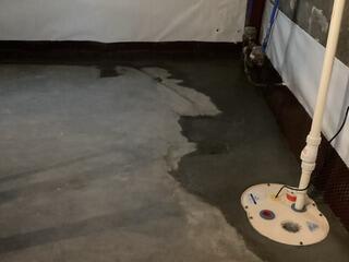 Our crew installed our patented WaterGuard drainage system leading to our SuperSump sump pump, giving this homeowner peace of mind and no water seepage for years to come.
