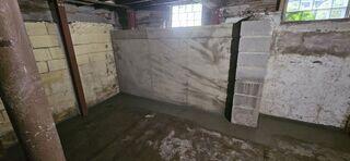 Our StableLock system completely stabilizes the wall to prevent any future wall failure.