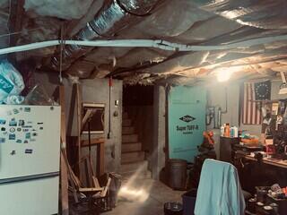 This basement had ongoing water seepage and needed a permanent solution.
