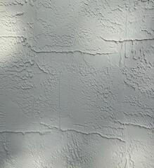 Although they may not appear noticeable at first glance, small hairline cracks along the exterior walls of a home can indicate potential foundation settlement issues.