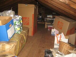 This homeowner was using their attic for storage, but it wasn't properly insulated, causing the home to be uncomfortable and drafty.