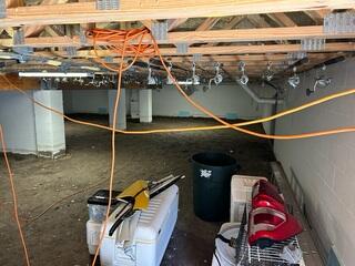 An LRE Design Specialist conducted a thorough inspection of the homeowner's crawl space to assess its condition and develop a comprehensive solution for preventing future moisture damage.
