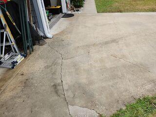 Multiple cracks had formed across the homeowner's driveway over time, and if left unaddressed, they risked spreading and causing further damage.