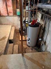 This basement had ongoing water seepage every time it rained, so they needed a permanent solution.