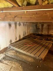 This crawlspace has visible signs of moisture and needs a proper encapsulation system.