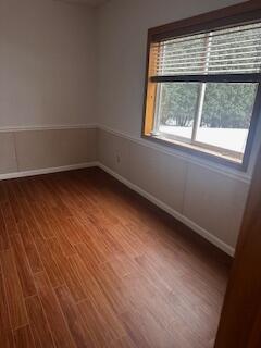 The basement is now a fully finished and functional living space, designed for comfort and practicality, with stylish flooring and a clean, inviting atmosphere.