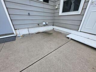 Before our installation, this homeowner struggled with unlevel concrete that had large unappealing gaps.
