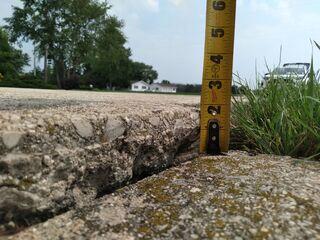 Facing an unlevel driveway, a homeowner from Van Dyne, WI, turned to us for help. The uneven surface posed a trip hazard and detracted from their home's curb appeal.