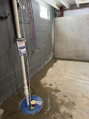 Our crew installed a full waterproofing system as well as a new wall for this homeowner!
