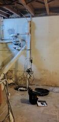 This basement was getting water seepage from heavy rains in their basement. They had an old, inactive sump pump that was not doing anything to help this issue.