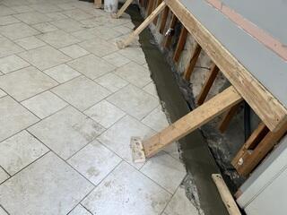 Interior Basement Drainage System Cemented