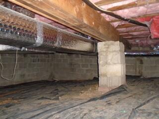 This crawlspace had moisture and musty odors, so needed permanent encapsulation.