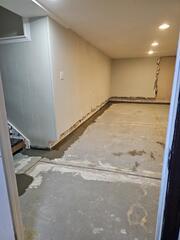 Our crew installed a new drainage system in this basement