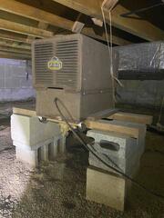 This Oasis dehumidification system was rusted, inefficient, and not automatic, unlike the SaniDry Sedona dehumidifier we installed later.