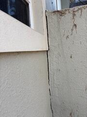 The homeowner noticed that the stem wall of their elevated pool deck had begun to separate from the rest of the home - a clear sign that the foundation had shifted due to underlying soil movement.