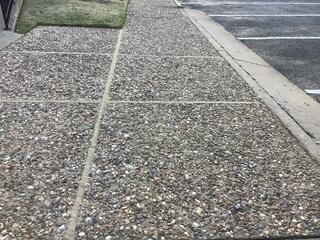 Re-leveled Concrete Transition Near Parking Area