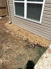 Gravel Drainage Bed Prevents Foundation Water Damage