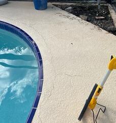 Over time, numerous cracks had spread across the homeowner's concrete pool deck, prompting them to seek a reliable repair solution to prevent the damage from getting any worse.