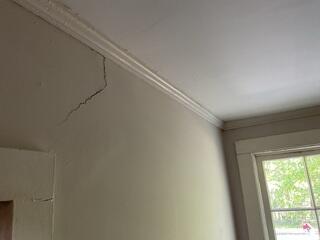 Ceiling Cracks Reveal Shifting Framework