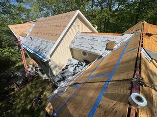 Lastly, we install VeloraOne Roof Underlayment across the rest of the roof. This protective layer helps keep rain from getting beneath the shingles and soaking into the plywood, which can lead to mold and leaks