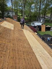 Here, you can see the newly installed plywood decking during the roof replacement. Any rotted or soft boards were removed and replaced to ensure a solid, long-lasting foundation. These fresh boards are critical for supporting the roofing system and preventing future issues like leaks or sagging.