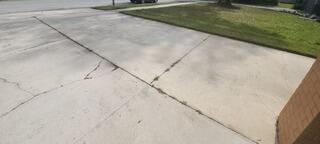 The homeowner's concrete driveway had become uneven over time due to the settlement of the underlying soil.