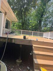 We are right in the middle of replacing the existing cedar decking with new, pressure-treated wood that will last longer and provide better protection against the elements.