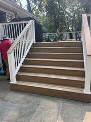 The installation of the new stair & rail system looks great. New pressure-treated wood makes the difference.