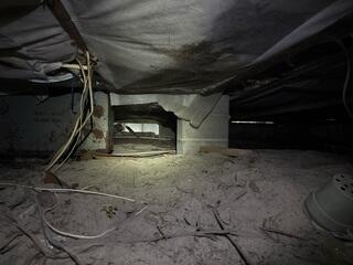 The inspection conducted by the LRE Design Specialist revealed elevated levels of moisture and humidity in the crawl space, with no existing system in place to properly regulate or control the moisture.