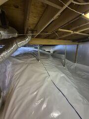 A full CleanSpace vapor barrier system was installed to protect the home from ground moisture and humidity. SmartJack support posts reinforce the floor system, ensuring long-term structural integrity. The sealed environment helps regulate temperature, reduce mold risk, and safeguard essential systems like ductwork and plumbing. This transformation brings lasting protection and peace of mind to the Beech Mountain homeowner.