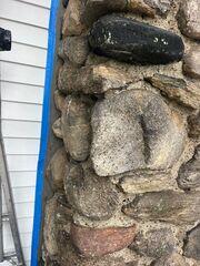 We are making sure the cement & sand mixture doesn't get tin the existing siding. Making for a clean & professional look.