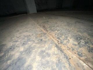 Debris Ruining Vapor Barrier.