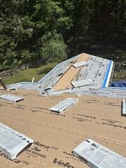 With the roof deck ready, we installed SealoronXT Deck Tape over all plywood seams, followed by SealoronXT Ice & Water in key leak-prone areas. To finish, we applied VeloraONE Roof Underlayment across the entire roof, creating a strong, watertight base for the new shingles.