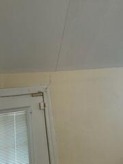 In addition to feeling instability in the floors, the homeowner also noticed cracks forming in the walls, prompting them to schedule a professional crawl space inspection to identify potential structural issues.