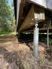 Close-Up of Helical Pier Installation