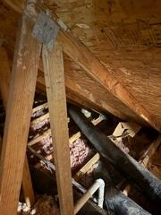 This low R-Value fiberglass was not dodging drafts from entering the home.