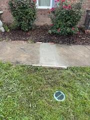 Clean Finish: Discreet Drainage Outlet and Concrete Restoration - Winston-Salem, NC