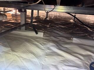 SmartJacks were positioned under the weakened beams and then adjusted to the proper height and tightened to stabilize.