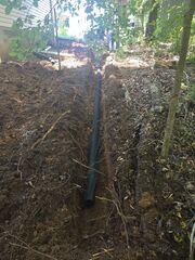 Drainage System Installation to Redirect Water Away from Foundation