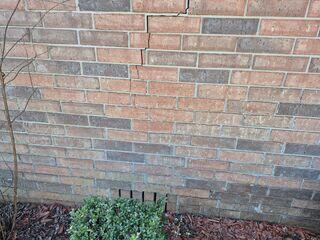 Foundation settlement causing cracks.