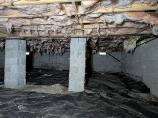 In this photo, you can see that the crawl space supports are sinking and starting to lean. The SmartJack system, once installed, will stabilize this crawl space to prevent further sinking and lift the structure back up.