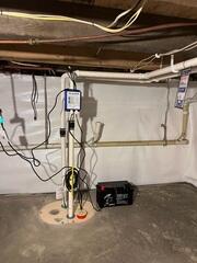 New Poured Slab, TripleSafe Sump Pump, and CleanSpace Wall System